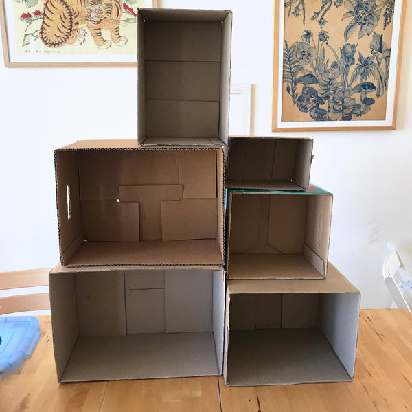 dollhouse of a cardboard box