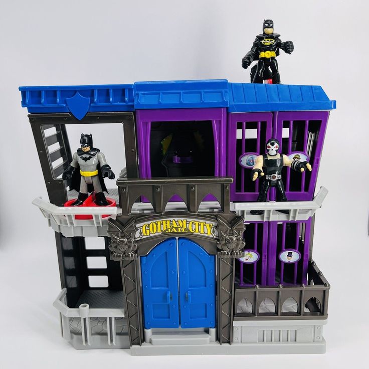 dc superhero doll house