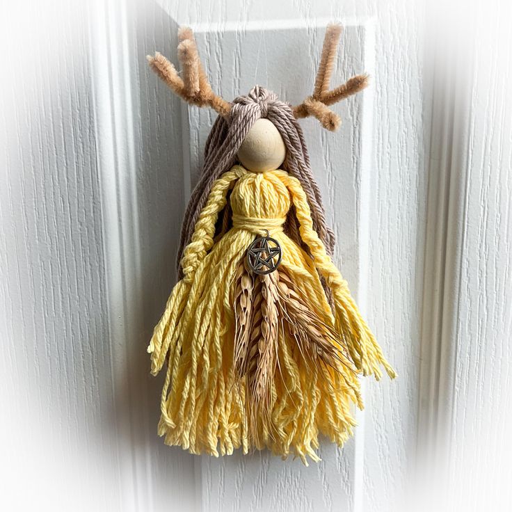 how to make a yarn doll