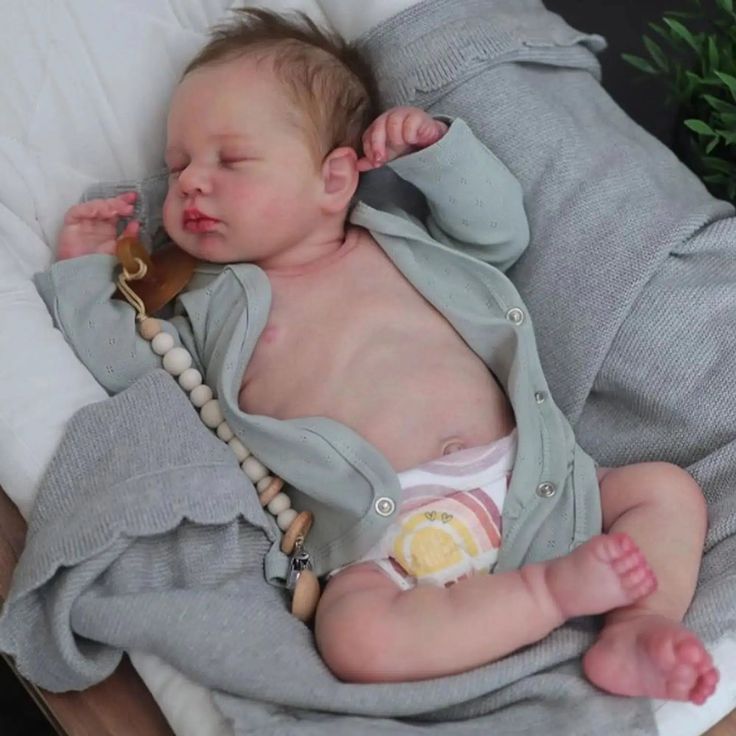 realistic baby doll